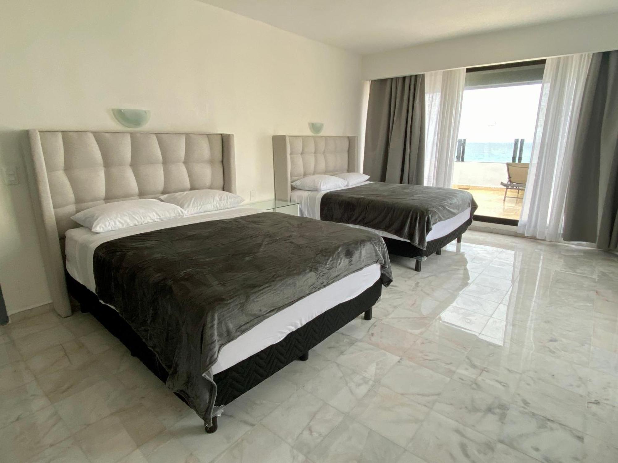 Condo In Ocean Front Resort カンクン 部屋 写真
